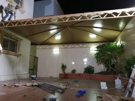 إصلاح تمزق أقمشة المظلات في المدينة المنورة